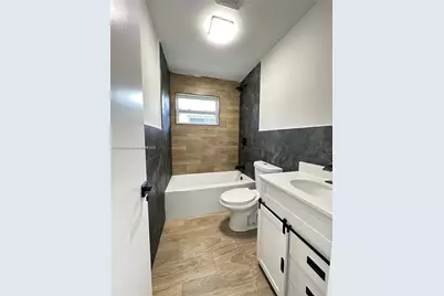 1443 NW 34th St, Miami, FL 33142 - Photo 7