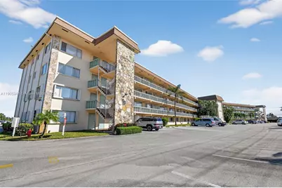 300 S Village Green Cir S #407, Palm Springs, FL 33461 - Photo 1