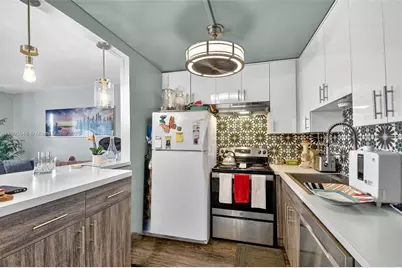 300 S Village Green Cir S #407, Palm Springs, FL 33461 - Photo 9