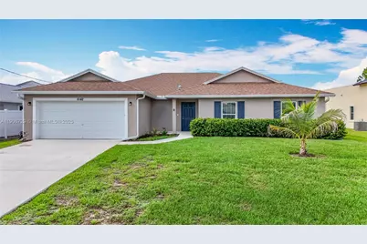 6142 NW Hopkins Ave, Port Saint Lucie, FL 34986 - Photo 1