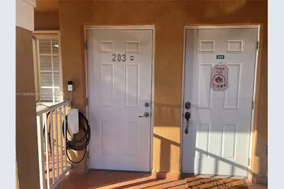 7845 W 36th Ave #203, Hialeah, FL 33018 - Photo 1