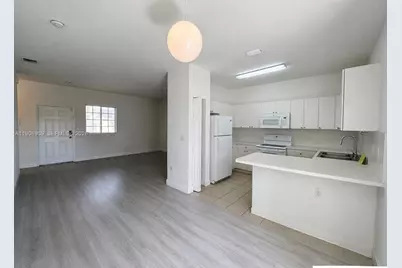 2590 NE 3rd Dr #203, Homestead, FL 33033 - Photo 1