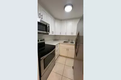 5050 NW 7th St #309, Miami, FL 33126 - Photo 7