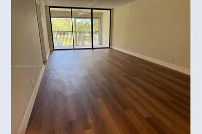 8592 W Sunrise Blvd #214, Plantation, FL 33322 - Photo 1