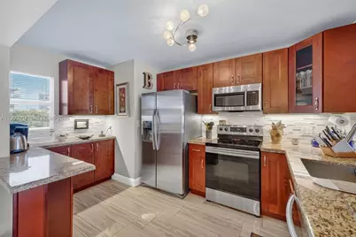 121 Golden Isles Dr #205, Hallandale Beach, FL 33009 - Photo 13