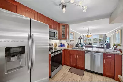121 Golden Isles Dr #205, Hallandale Beach, FL 33009 - Photo 1