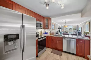 121 Golden Isles Dr, Hallandale Beach, FL 33009 - Photo 1