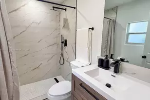 1025 NW 55th St, Miami, FL 33127 - Photo 11