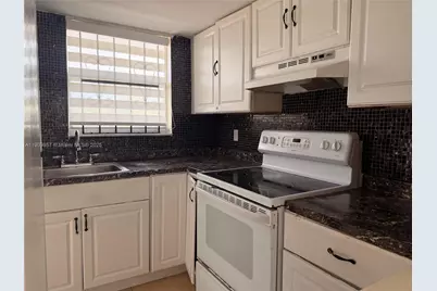 13725 NE 6th Ave #302, North Miami, FL 33161 - Photo 1