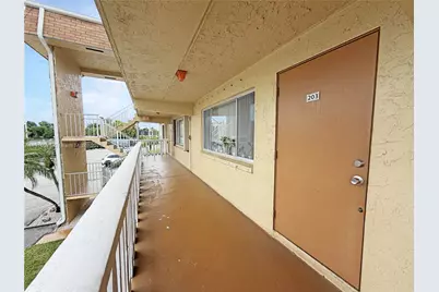 500 W Village Green Cir W #203, Palm Springs, FL 33461 - Photo 3