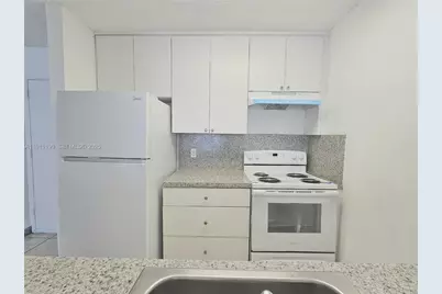 1225 NE 124th St #38B, North Miami, FL 33161 - Photo 1
