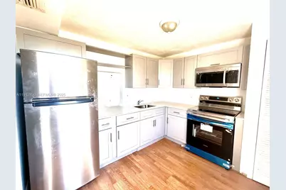 1401 NE 191st St #D409, Miami, FL 33179 - Photo 1