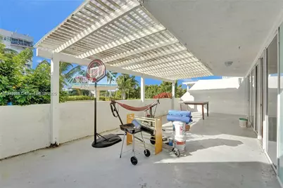 7601 E Treasure Dr #406, North Bay Village, FL 33141 - Photo 1