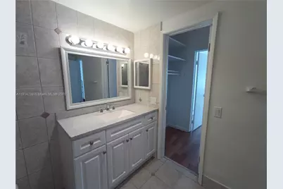 450 Golden Isles Dr #2B, Hallandale Beach, FL 33009 - Photo 11