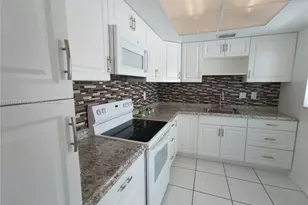 450 Golden Isles Dr, Hallandale Beach, FL 33009 - Photo 5