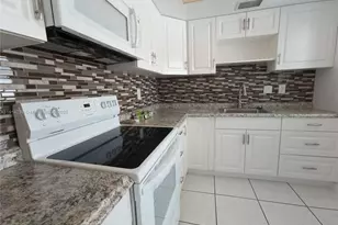 450 Golden Isles Dr, Hallandale Beach, FL 33009 - Photo 3