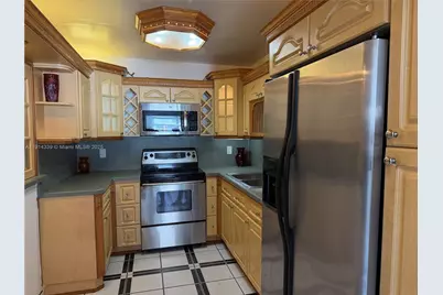1325 W 68th St #311, Hialeah, FL 33014 - Photo 3