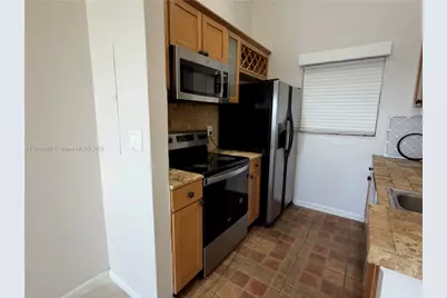 2831 N Oakland Forest Dr #304, Oakland Park, FL 33309 - Photo 3