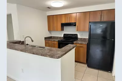 5840 W Sample Rd #201, Coral Springs, FL 33067 - Photo 3