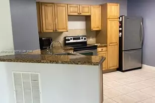 8901 Wiles Rd, Coral Springs, FL 33067 - Photo 13