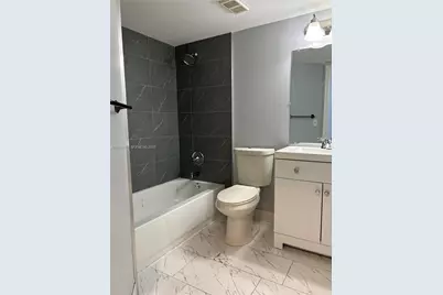 8801 Wiles Rd #306, Coral Springs, FL 33067 - Photo 5