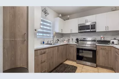 8390 NW 103rd St #102H, Hialeah Gardens, FL 33016 - Photo 11