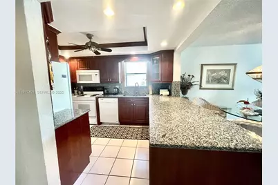 2309 S Cypress Bend Dr #311, Pompano Beach, FL 33069 - Photo 7