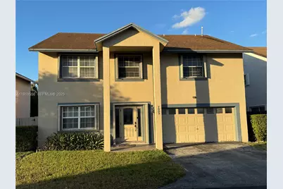 7809 NW 192nd St, Hialeah, FL 33015 - Photo 1