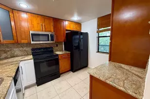 100 NW 76th Ave, Plantation, FL 33324 - Photo 5