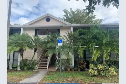 907 NE 199th St #204, Miami, FL 33179 - Photo 1