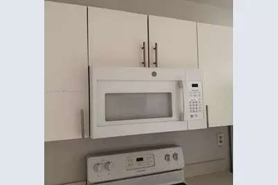 5501 NW 7th St #E301, Miami, FL 33126 - Photo 9