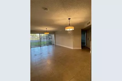 8801 Wiles Rd #108, Coral Springs, FL 33067 - Photo 5