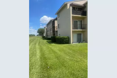 1089 N Benoist Farms Rd #107, West Palm Beach, FL 33411 - Photo 3