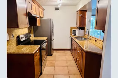 4990 NW 97th Pl #314, Doral, FL 33178 - Photo 13