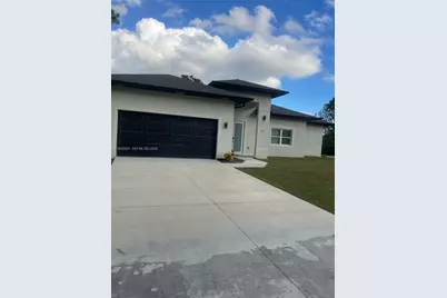 321 Briggs Ave S, Lehigh Acres, FL 33974 - Photo 7