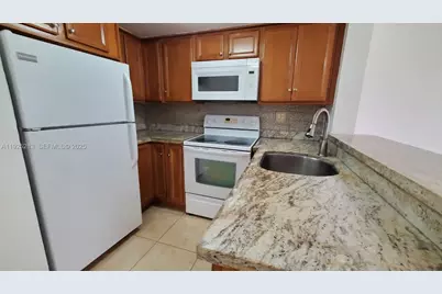 8665 NW 6th Ln #1-205, Miami, FL 33126 - Photo 5