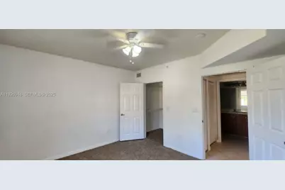 6505 Emerald Dunes Dr #307 PLUS GARAGE, West Palm Beach, FL 33411 - Photo 5