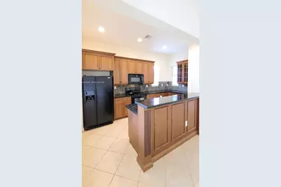 6033 NW 118th Dr #6033, Coral Springs, FL 33076 - Photo 7