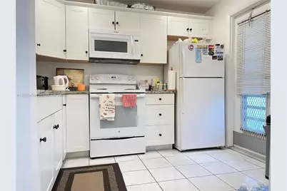 1599 NW 43rd Ave #108, Lauderhill, FL 33313 - Photo 1