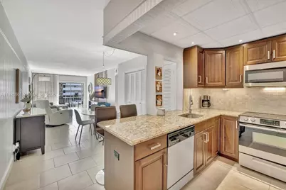 300 Golden Isles Dr #204, Hallandale Beach, FL 33009 - Photo 5