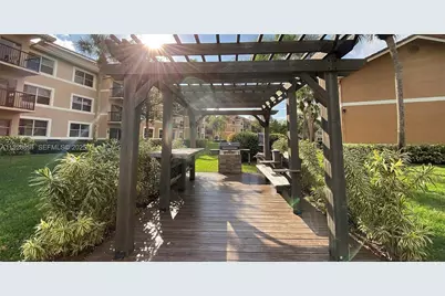 8741 Wiles Rd #208, Coral Springs, FL 33067 - Photo 1
