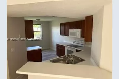 8741 Wiles Rd #208, Coral Springs, FL 33067 - Photo 9