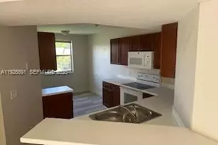 8741 Wiles Rd, Coral Springs, FL 33067 - Photo 9