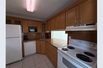 15969 NW 64th Ave #504, Miami Lakes, FL 33014 - Photo 7