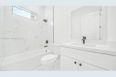 840 Guinne Ln, Lehigh Acres, FL 33974 - Photo 29