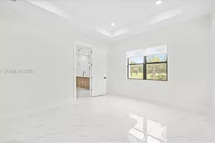 840 Guinne Ln, Lehigh Acres, FL 33974 - Photo 23