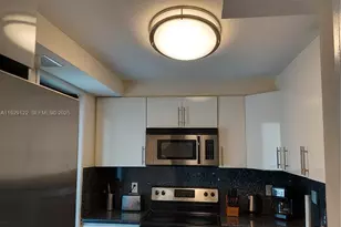 301 Golden Isles Dr, Hallandale Beach, FL 33009 - Photo 27