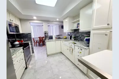 16565 NE 26th Ave #2B, North Miami Beach, FL 33160 - Photo 1