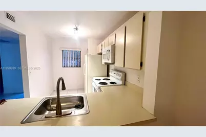 851 NE 207th Ln #204-13, Miami, FL 33179 - Photo 1