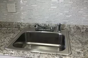 450 Golden Isles Dr, Hallandale Beach, FL 33009 - Photo 11